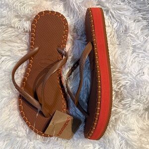 Havaianas Brown Flip Flops with Red Accents
